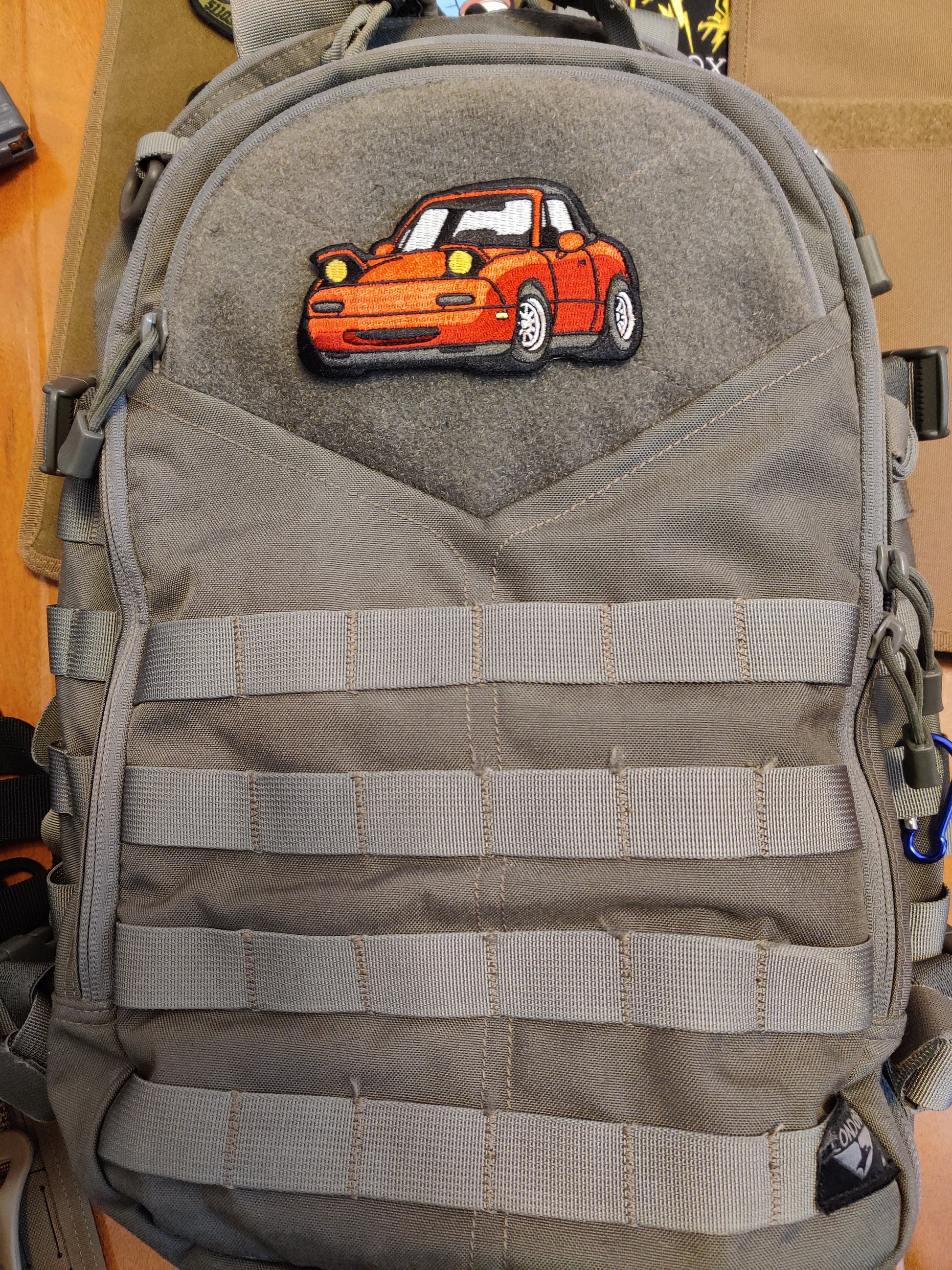 Mazda MX-5 Miata NA Hook and Loop JDM Meme Patch Attached to a Backpack - Car-Themed Accessory